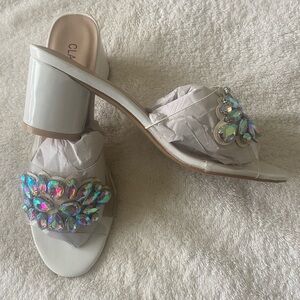 Clarks Silver Mules with Block Heel and Floral Embroidery